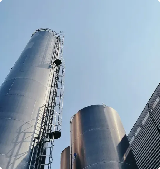 Stainless-steel silos at an industrial plant